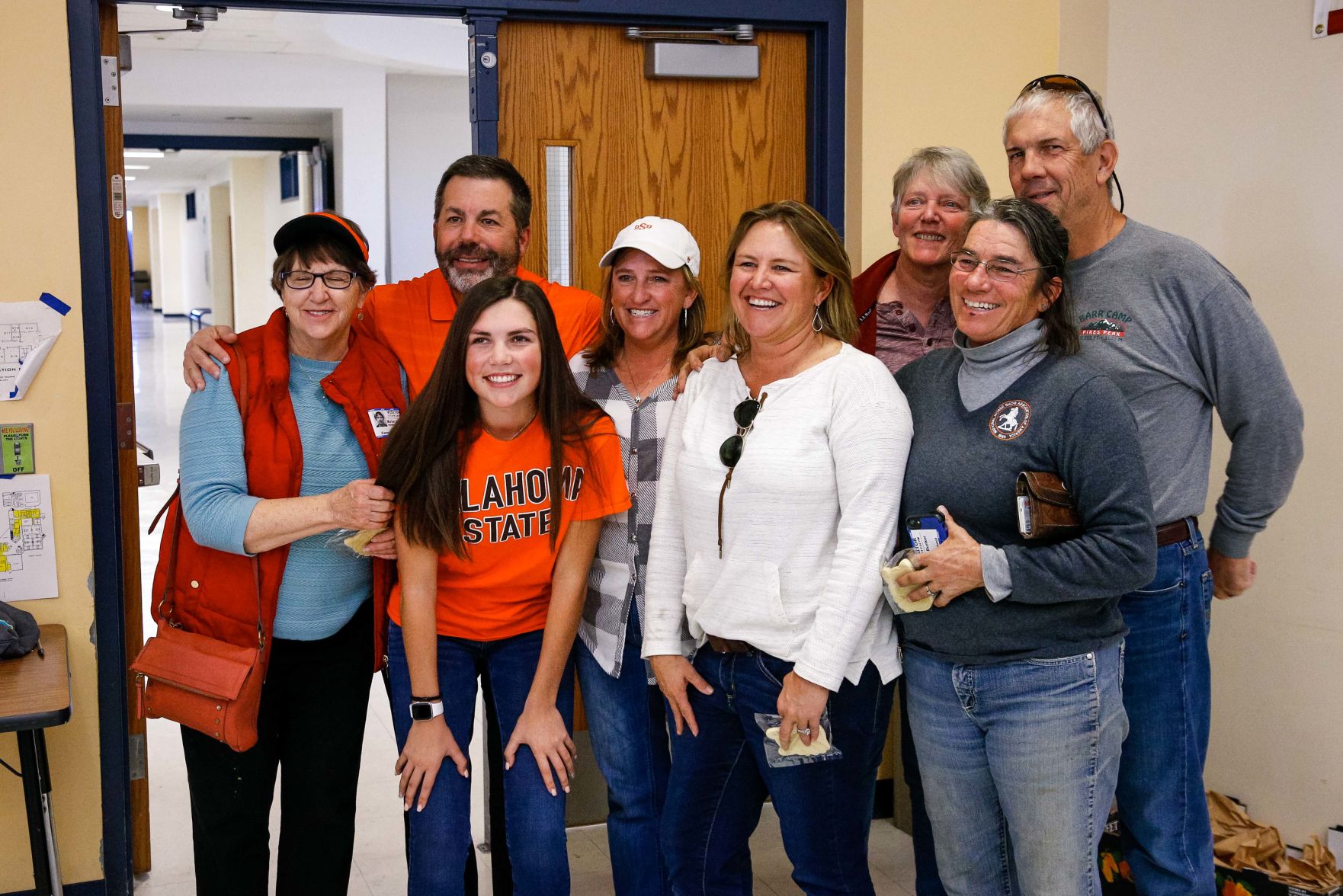 SIGNING DAY: Rampart athletes sign their National Letter of Intent